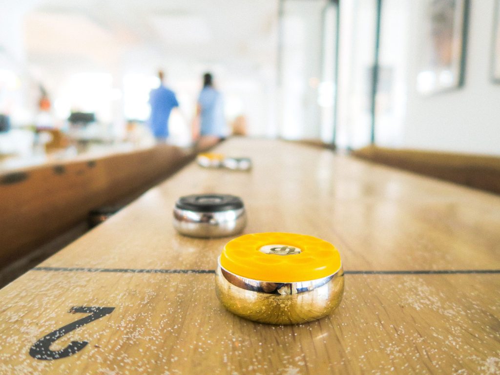 How To Play Shuffleboard Rules Strategy For Table Shuffleboard